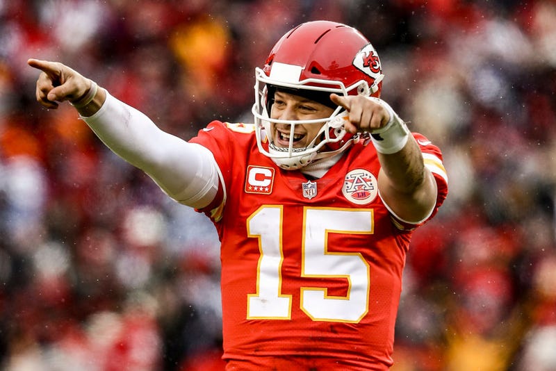  Patrick Mahomes #15 of the Kansas City Chiefs points to the sidelines in celebration after throwing a touchdown against the Kansas City Chiefs during the first quarter of the AFC Divisional Round playoff game at Arrowhead Stadium on January 12, 2019 in Kansas City, Missouri. 