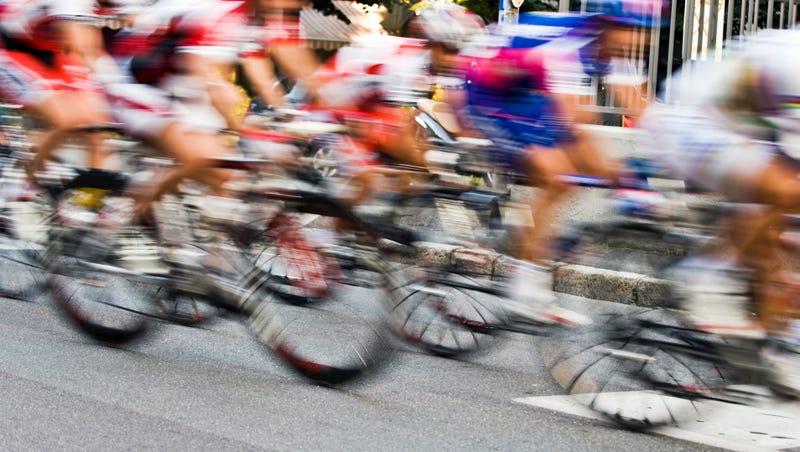 Motion blur of bicycle race riders.