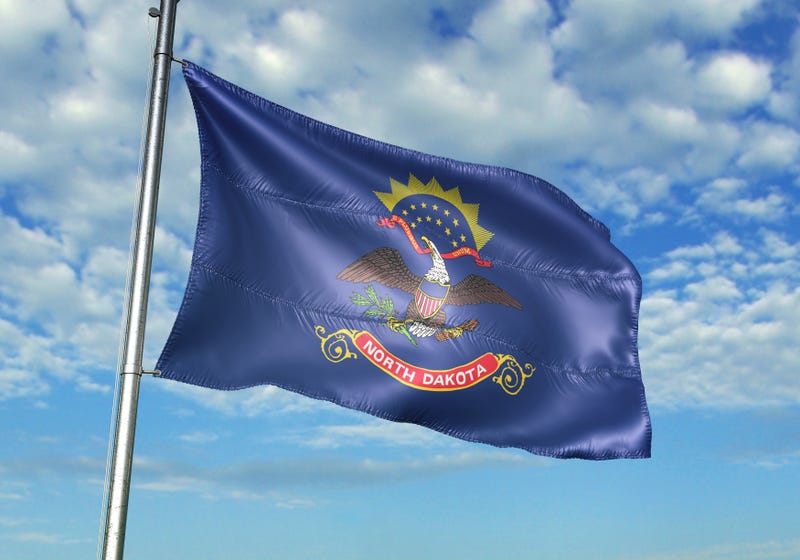 North Dakota flag at half-mast
