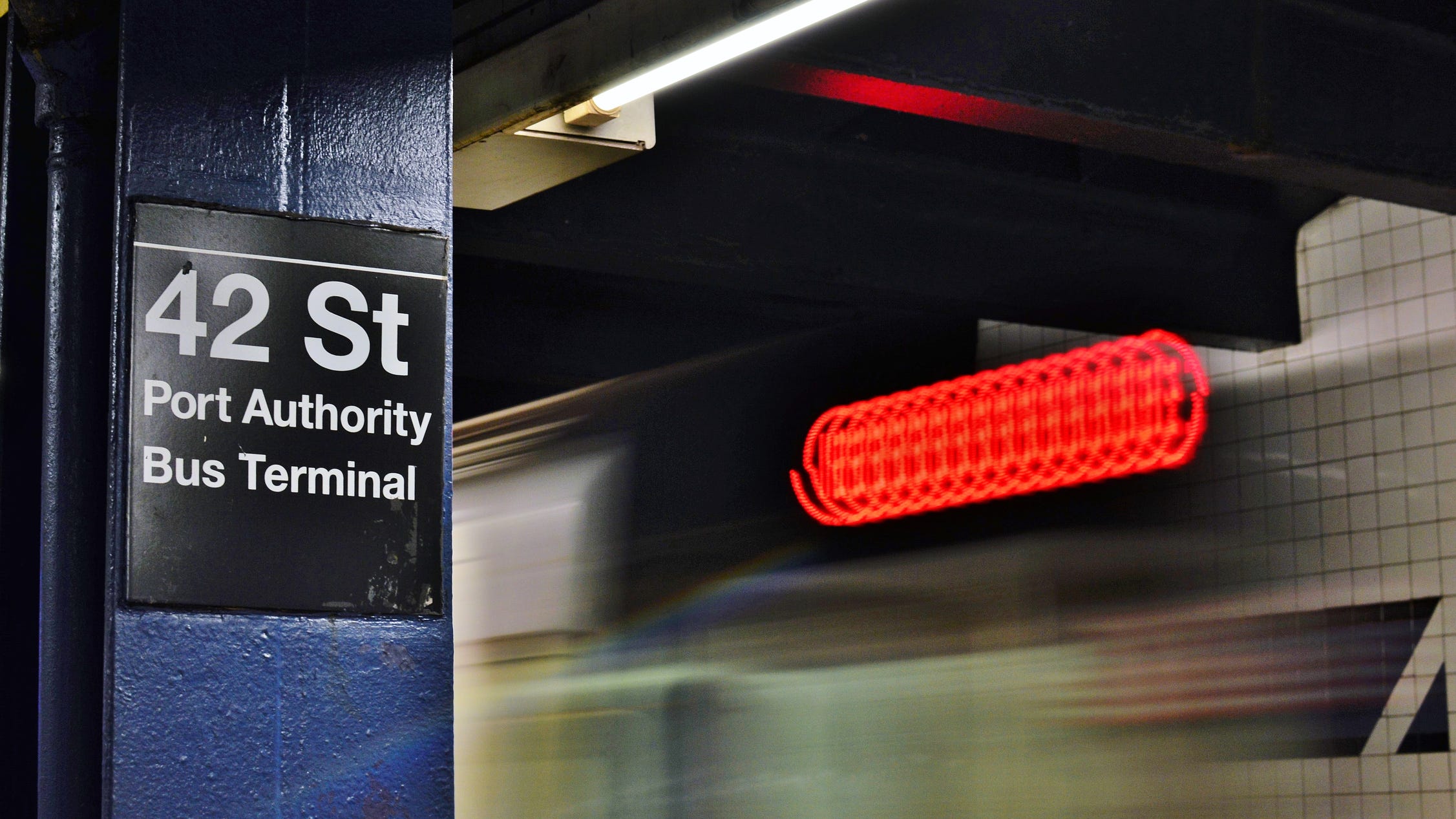 Man dead after falling onto subway track, catching fire at Times Sq. subway station
