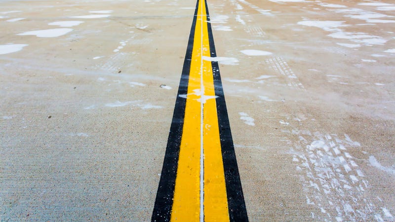 Snow on an airport runway - stock photo