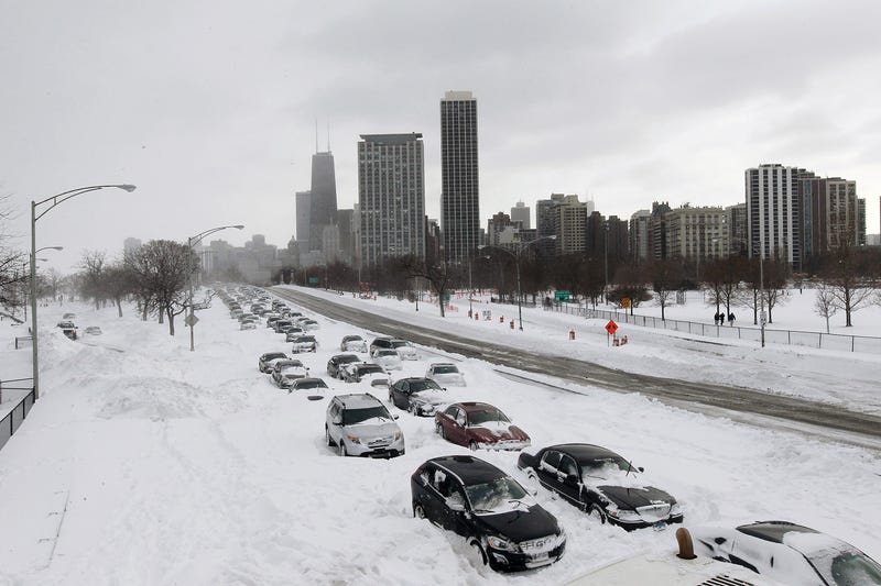 Cars sit in the northbound lanes of Lake Shore Drive after accidents and drifting snow stranded the drivers during last night's blizzard February 2, 2011 in Chicago, Illinois. As of late morning over 20 inches of snow had fallen, making this snowstorm the third largest recorded in the city.