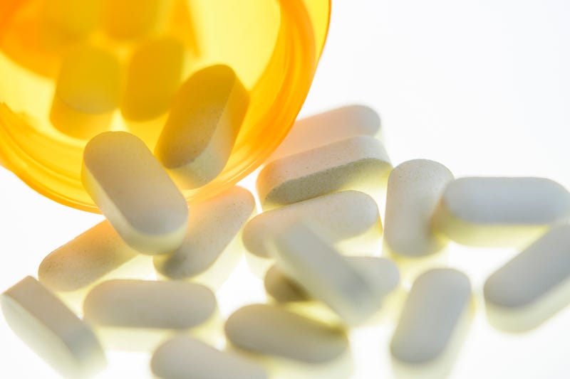 Pills spilled from bottle.