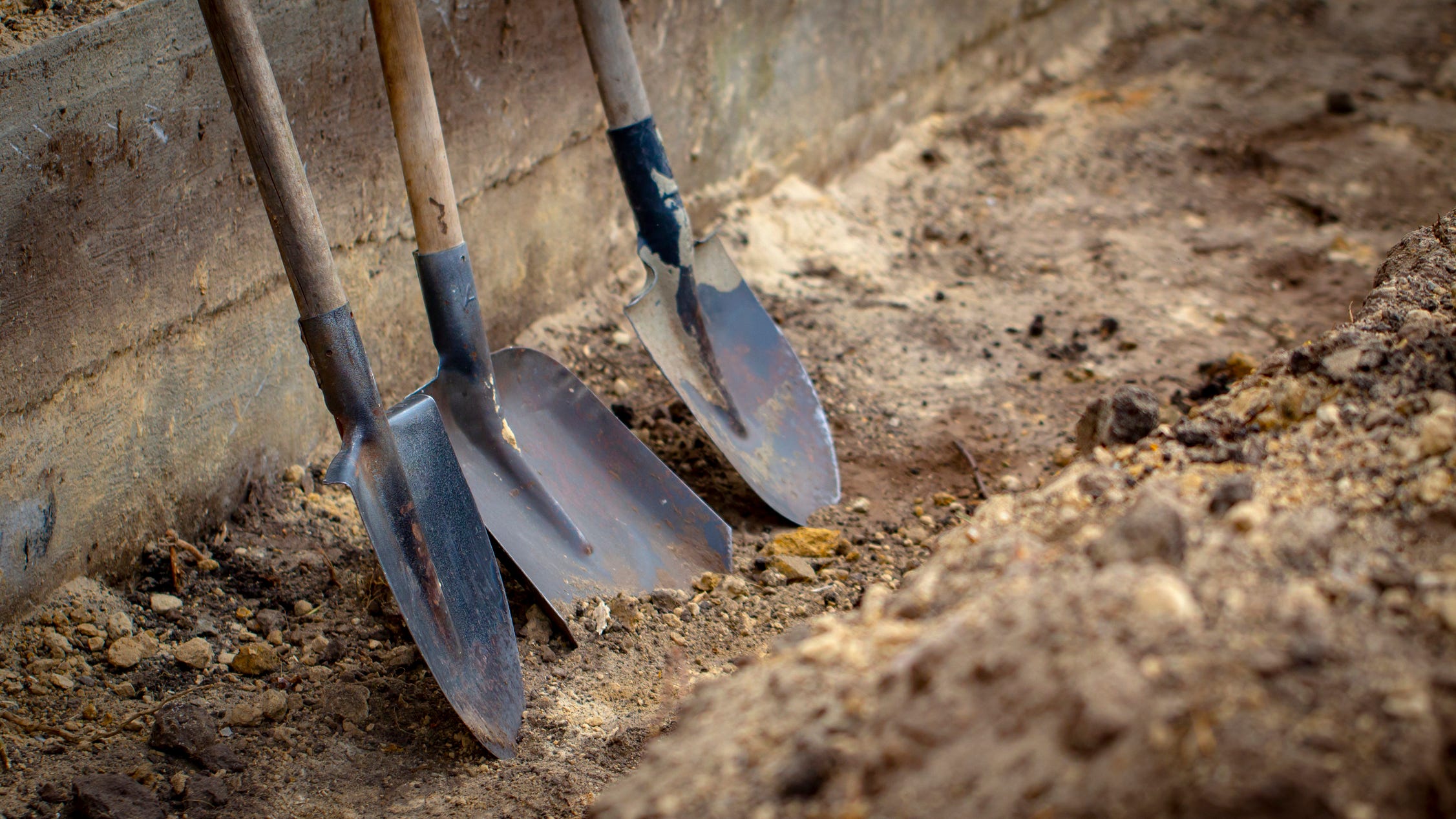 Collapsed trench in West Michigan kills two men