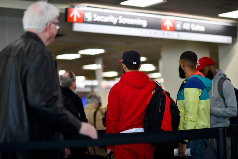 Travelers wait in long lines after Philadelphia Airport TSA and airport workers held a protest rally outside the Philadelphia International Airport on January 25, 2019.