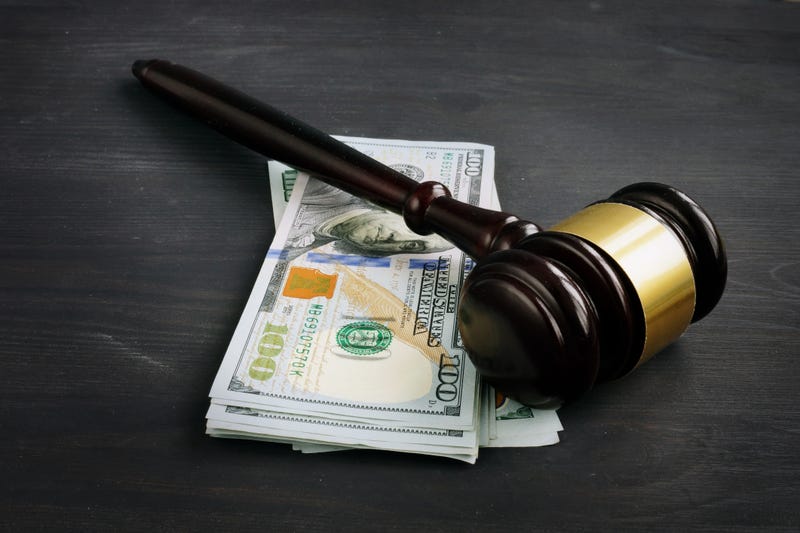 Cash and judge's gavel