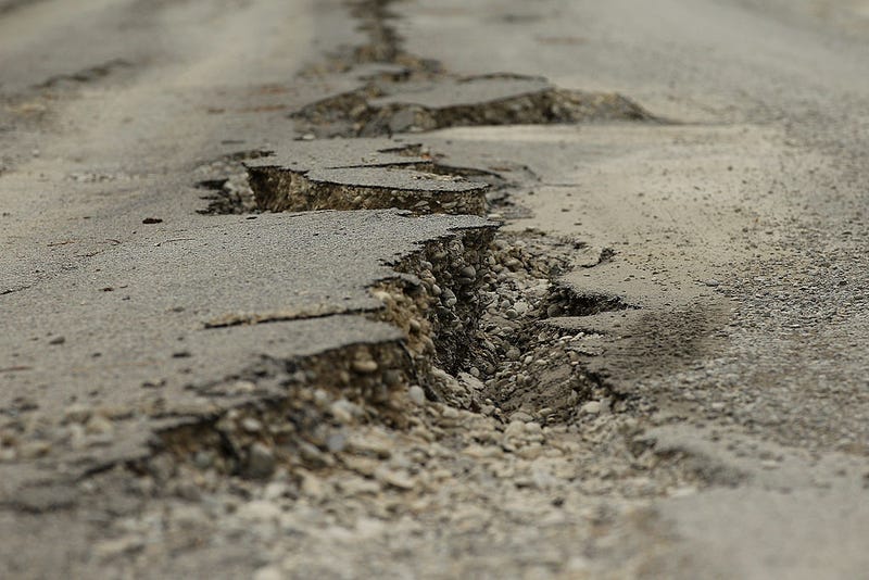 File photo of crack in road