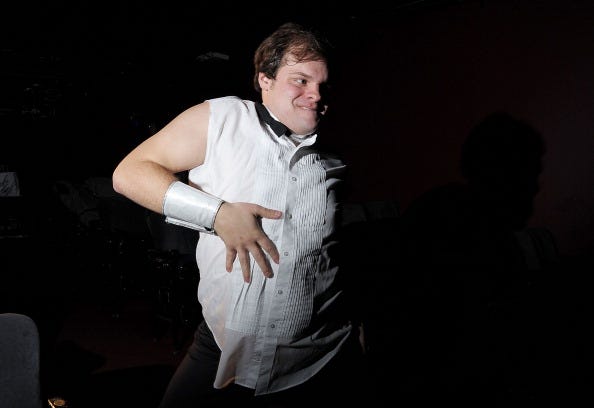 Alan Pagano plays Chris Farley on stage