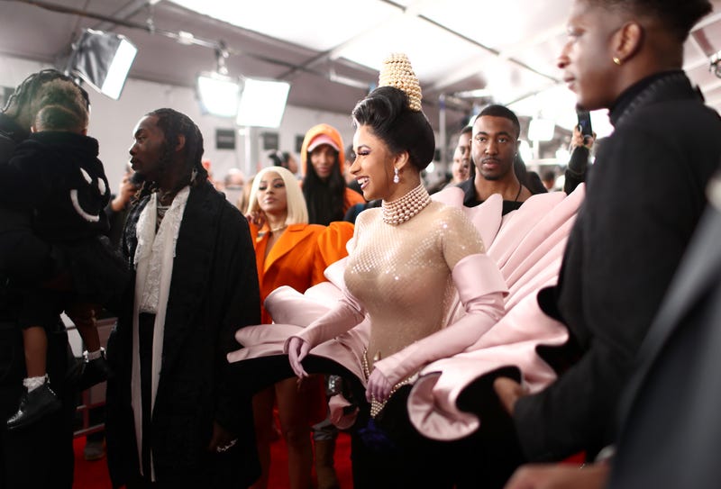 cardi laughing on the red carpet at the 61st annual grammy awards