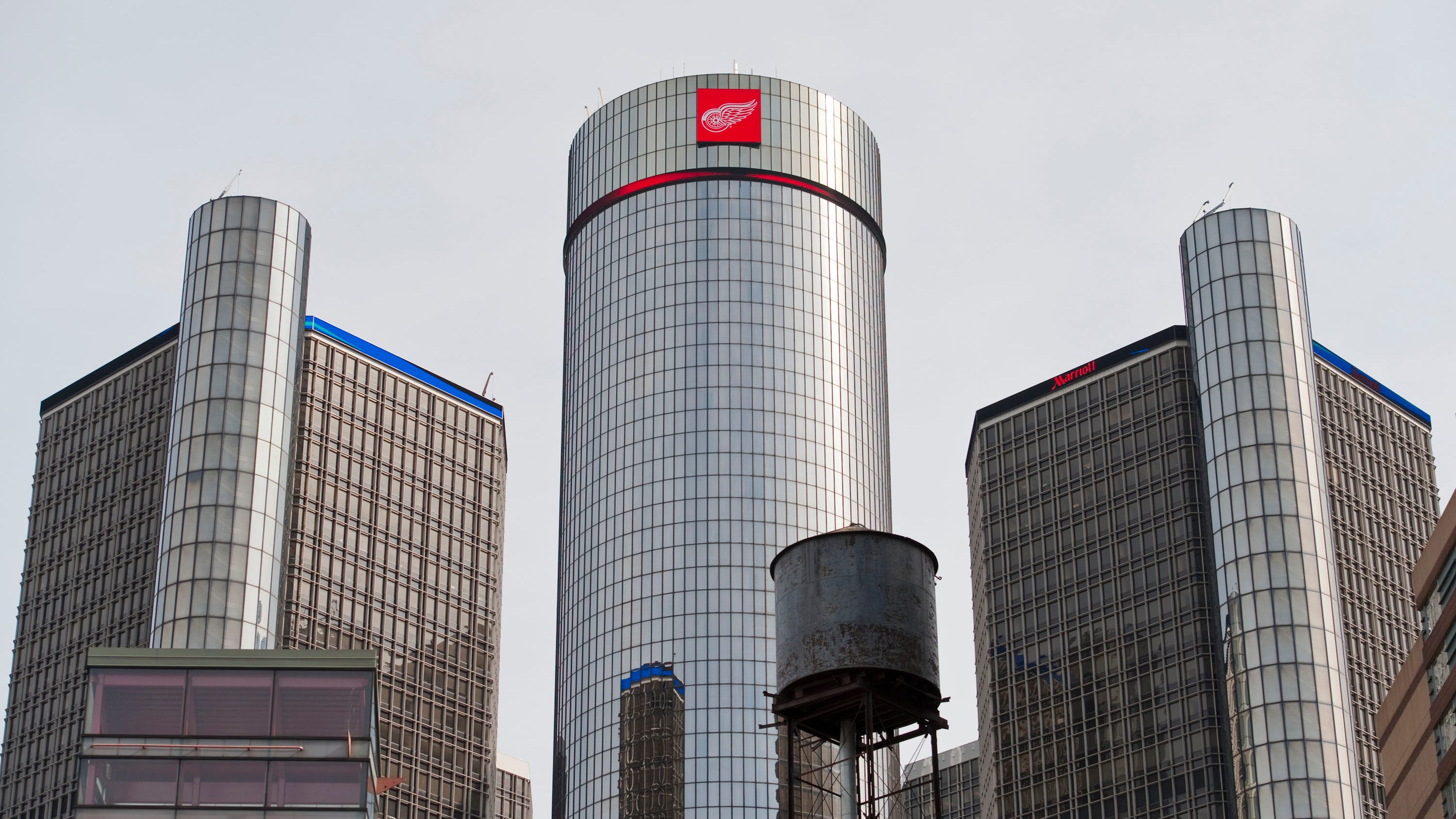 Detroit police have a person in custody after they scaled the Renaissance Center on Sunday
