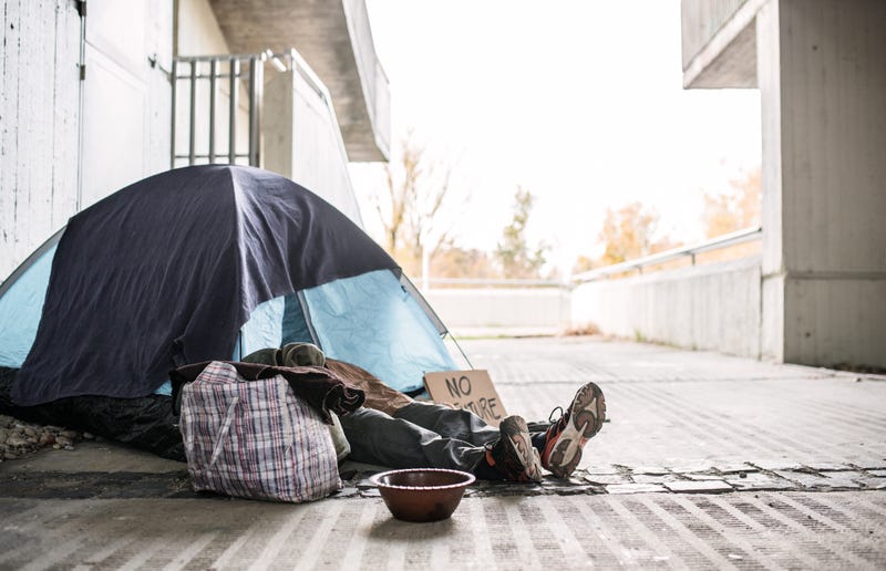Unhoused person in a tent