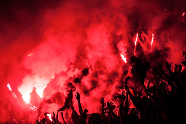 Protests concept with flares and smoke. 