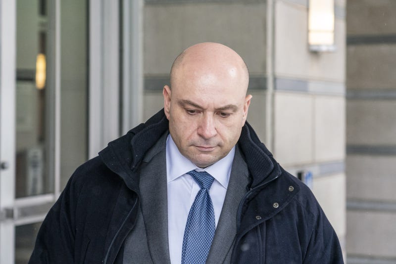 Gene Daniel Levoff, a former lawyer in charge of Apple Inc.'s insider trading policy, exits from federal court in Newark, New Jersey, U.S., on Wednesday, Feb. 20, 2019. Levoff appeared in federal court a week after prosecutors said he had traded on confidential revenue and earnings filings since 2011. Levoff was released on a $500,000 bond after entering a not-guilty plea to insider-trading charges.