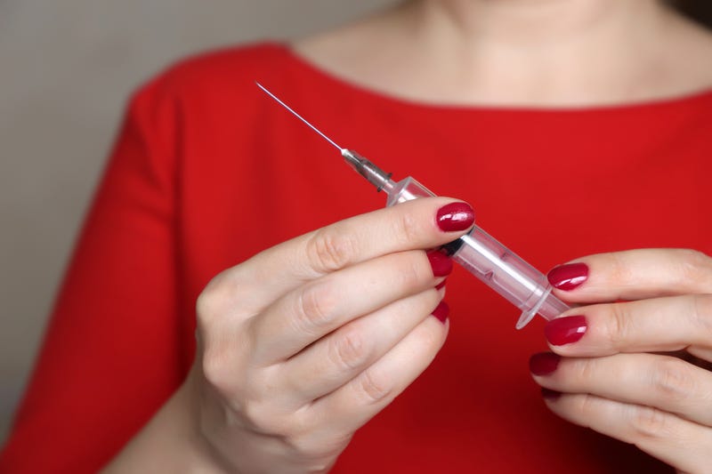 Concept of beauty therapist, plastic surgery, preparation for injection, cosmetic treatment or vaccination