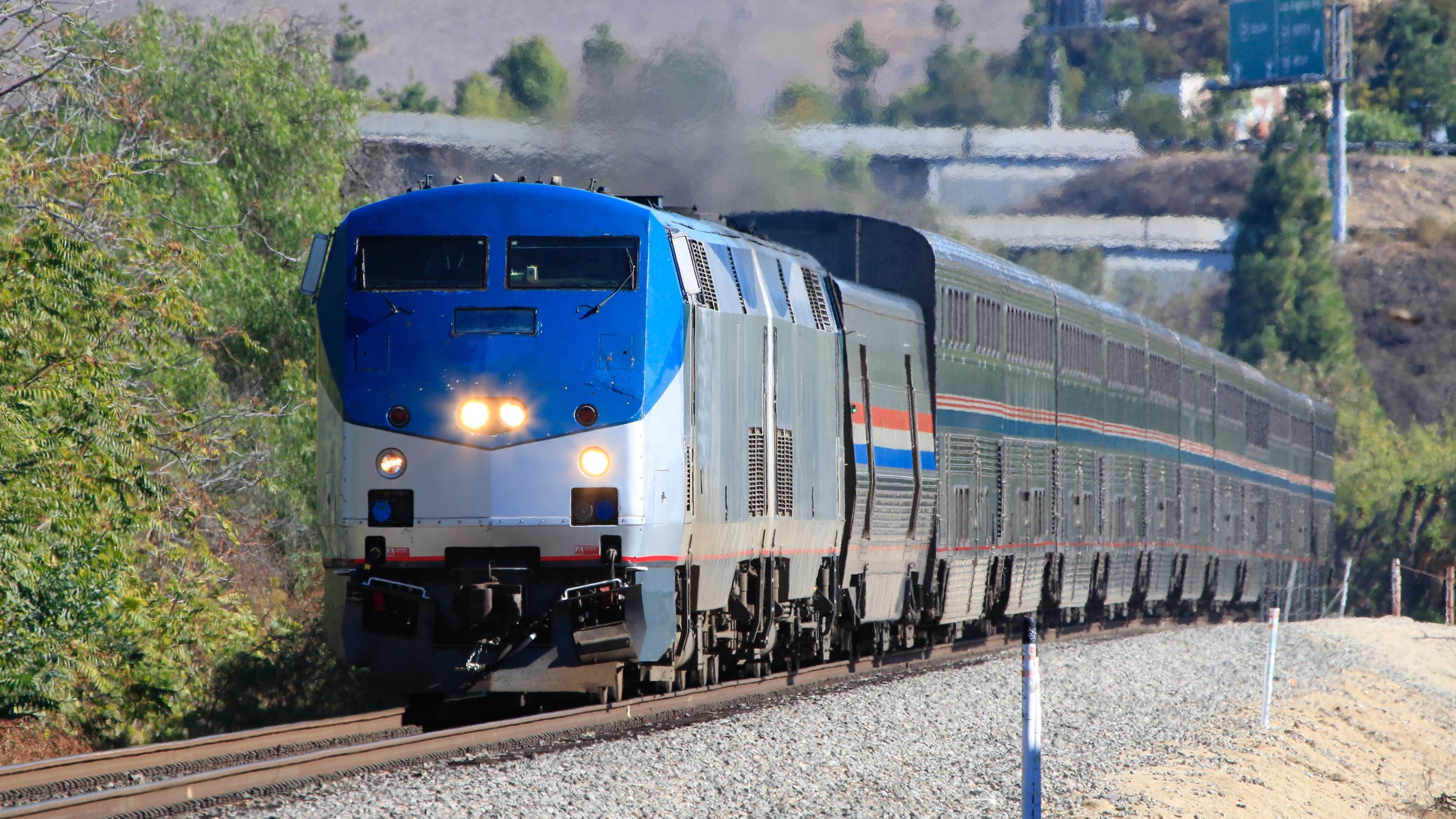 2 hurt, fuel leaks as Amtrak train collides with railroad vehicle in East Oakland