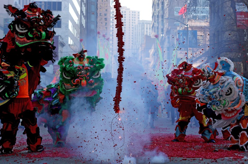 Lion dancers dance around firecrackers as they explode in the street while ushering in Chinese New Year on February 05, 2019 in San Francisco, California. 