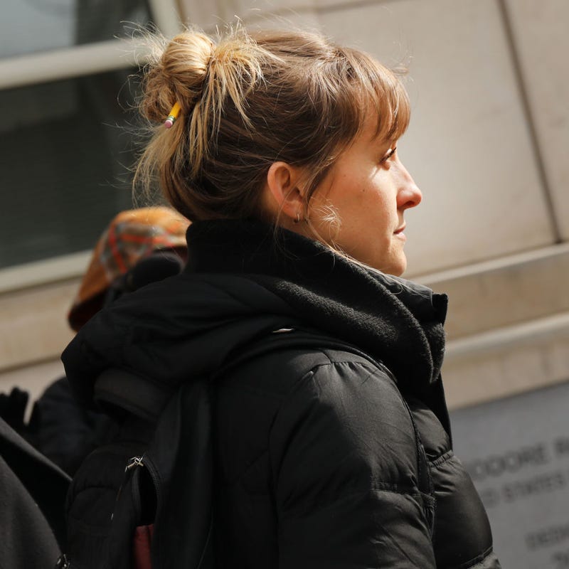 Actress Allison Mack leaves the Brooklyn Federal Courthouse with her lawyers after a court appearance surrounding the alleged sex cult NXIVM on February 06, 2019 in New York City.