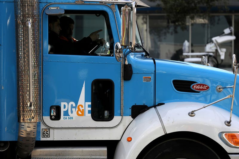 Pacific Gas and Electric (PG&E) workers remain at the scene of a three-alarm fire that started after a construction crew hit a gas line on February 07, 2019 in San Francisco, California.
