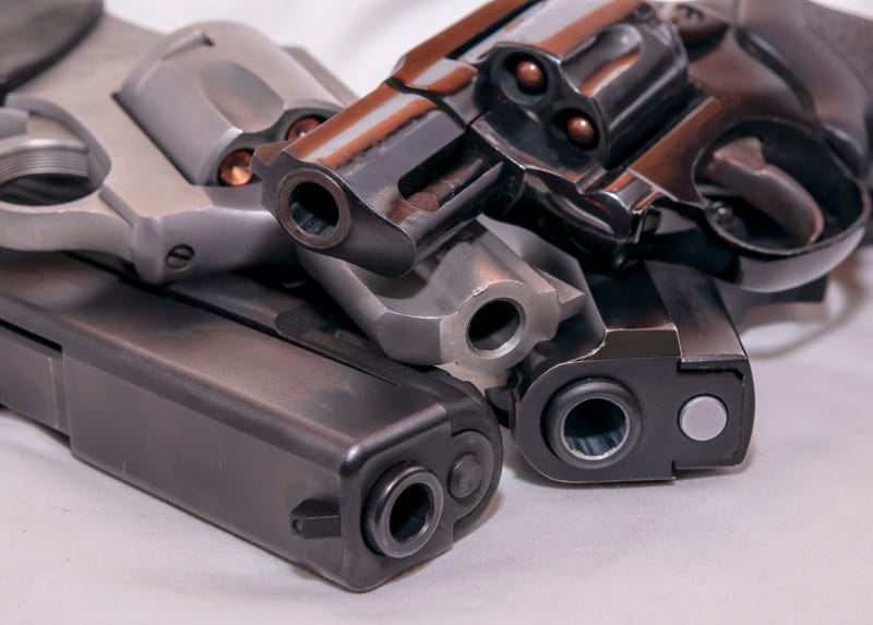 Four handguns