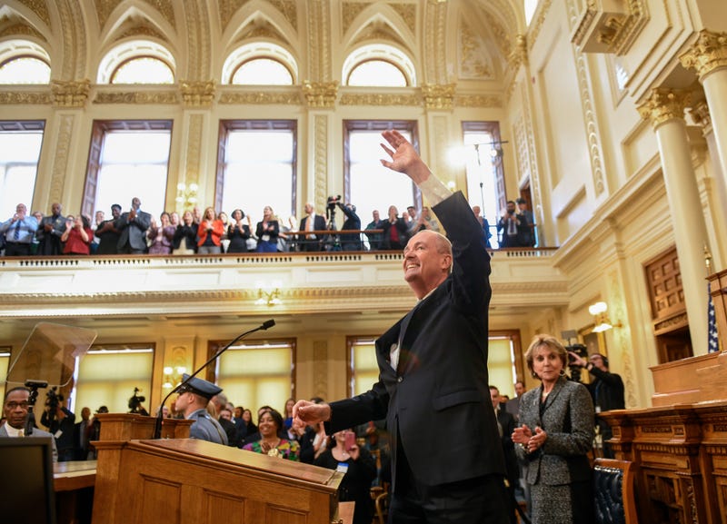 Phil Murphy, governor of New Jersey, waves during a fiscal year 2020 budget address at the New Jersey State Assembly chamber in Trenton, New Jersey, U.S., on Tuesday, March 5, 2019.