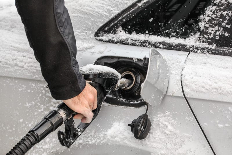 Pumping gas in the snow