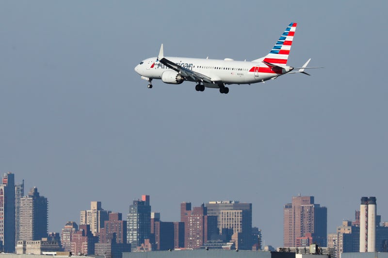 An American Airlines flight from Miami to New York City is seen over LaGuardia Airport