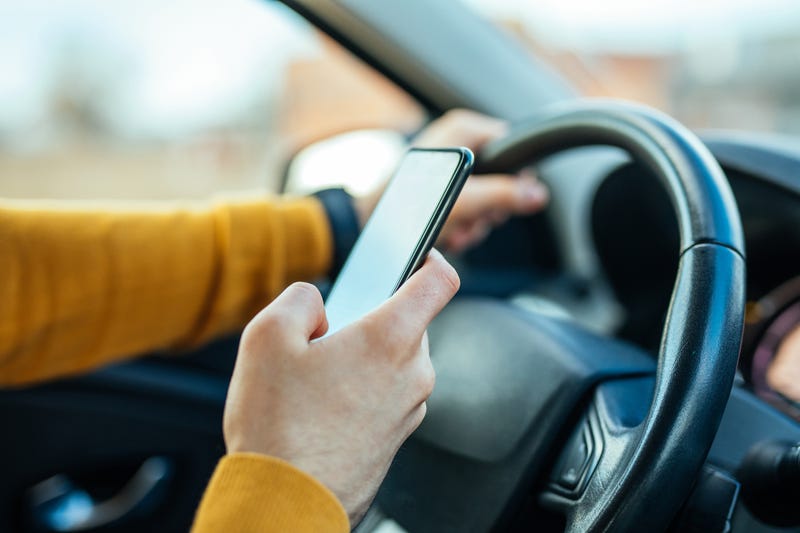 Pa. bill signed to ban handheld devices while driving