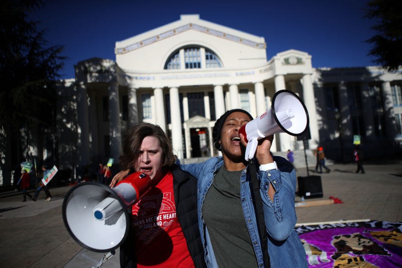 Oakland Unified School District teachers use bullhorns as they picket outside of Oakland Technical High School on February 21, 2019 in Oakland, California. 