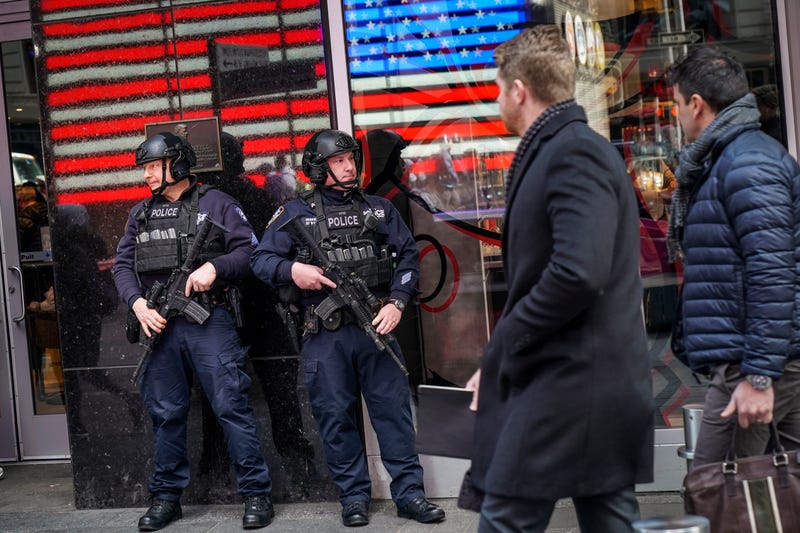 Members of the NYPD Counterterrorism unit patrol stand watch in Times Square