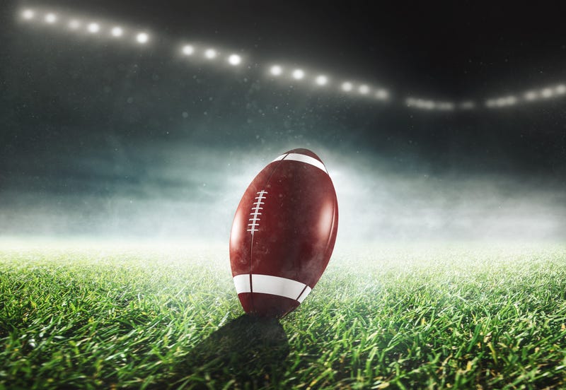 football on field at night