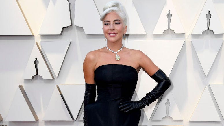 What's the health status of Lady Gaga's dog walker after shooting and stolen French bulldogs?