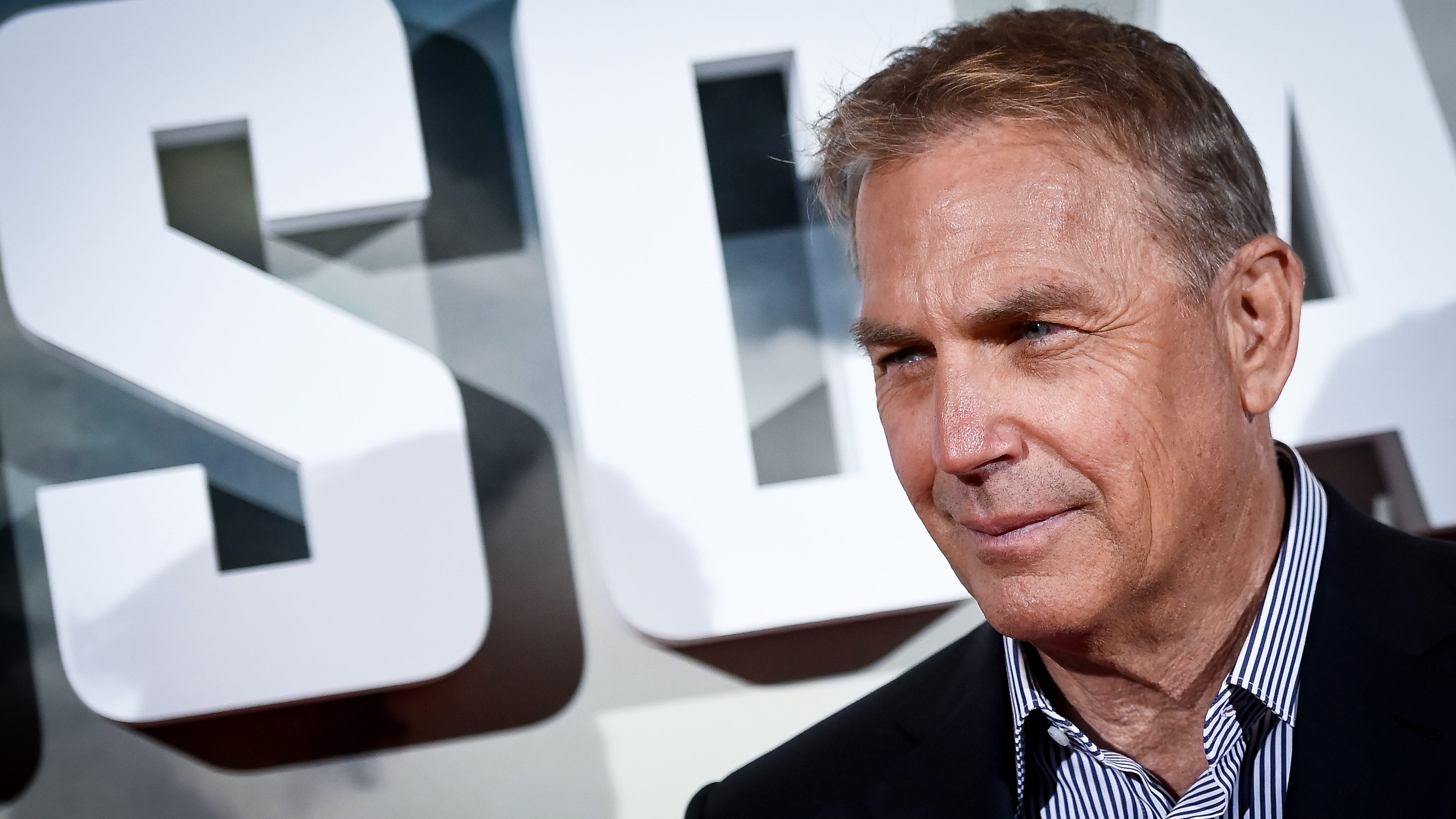 Kevin Costner gives belated Golden Globes win speech from bed