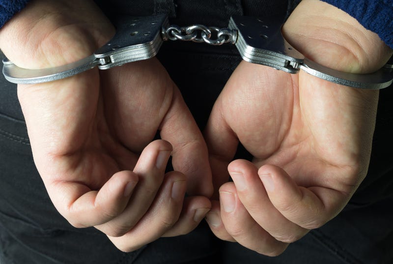 Hands in handcuffs 