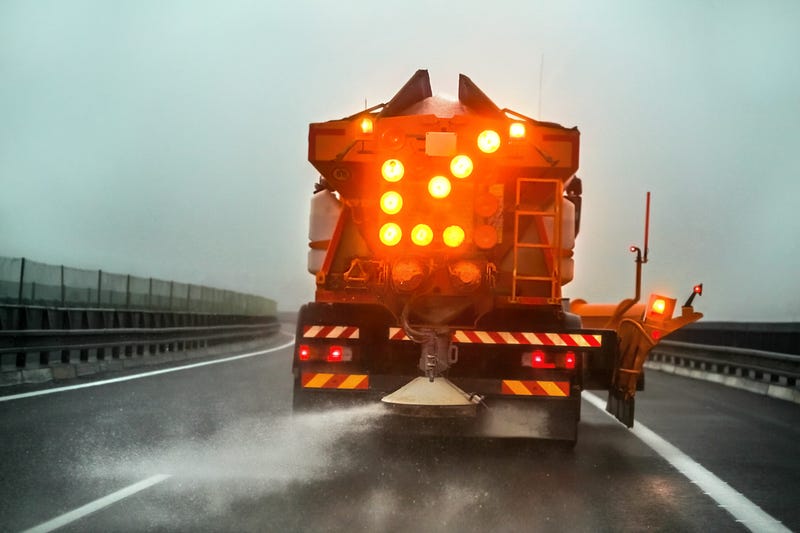 Salt truck in a winter storm