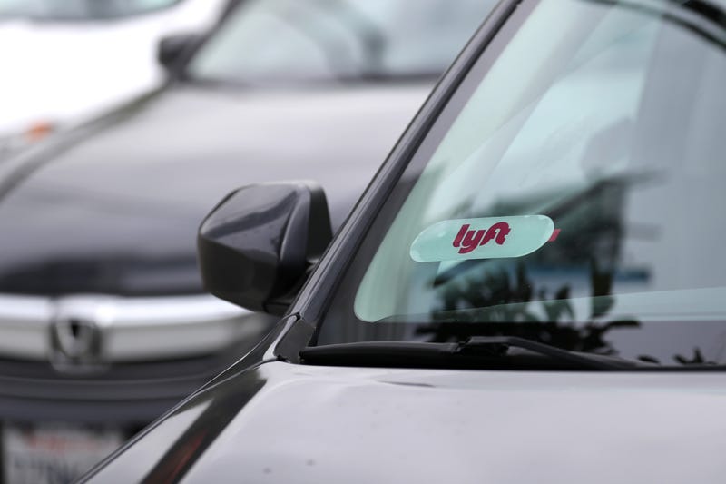 The Lyft logo is displayed on a car on March 7, 2019 in San Francisco, California.