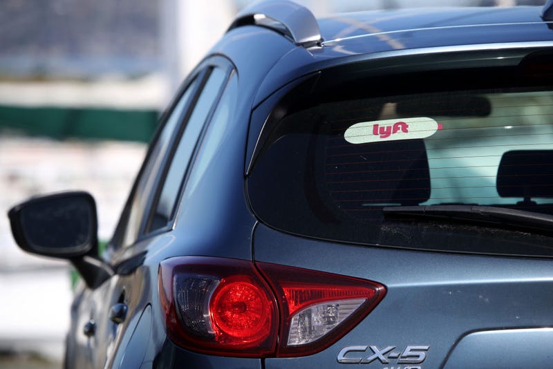 he Lyft logo is displayed on a car on March 11, 2019 in San Francisco, California.