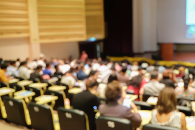 Students inside of a college lecture hall