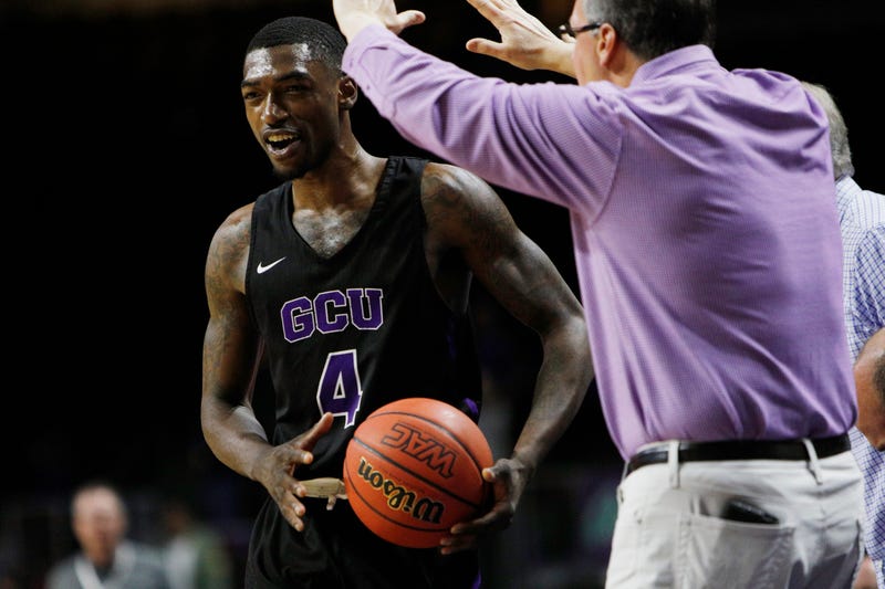 Oscar Frayer #4 of the Grand Canyon Lopes is cheered on by fans against the Utah Valley Wolverines during a semifinal game of the Western Athletic Conference basketball tournament at the Orleans Arena on March 15, 2019 in Las Vegas, Nevada. Grand Canyon won 78-74.