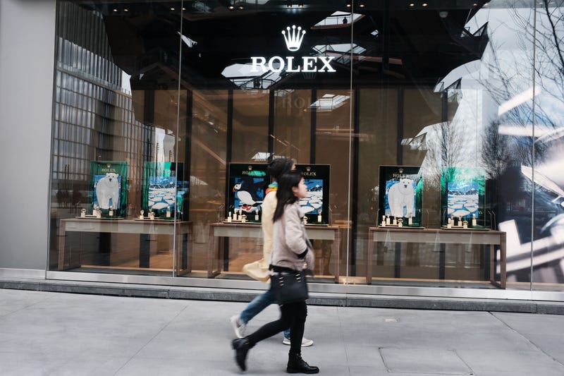 Visitors walk by the luxury shopping mall at the Hudson Yards development on the West Side of Midtown Manhattan in New York City. 