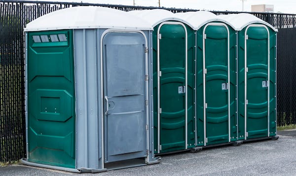 Portable bathrooms in a parking lot