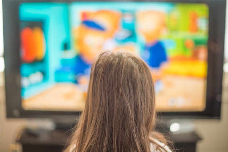 girl watches television