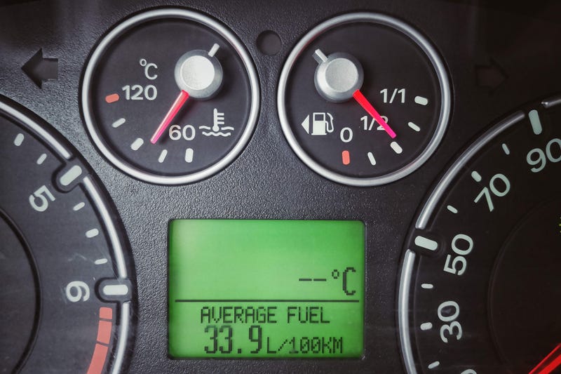 FILE - Color close up of a car's digital display, showing a very high fuel consumption.