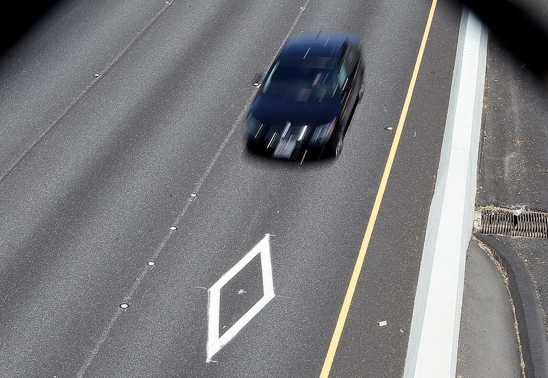 A car drives in the carpool lane on highway 101 on May 6, 2011 in San Rafael, California.