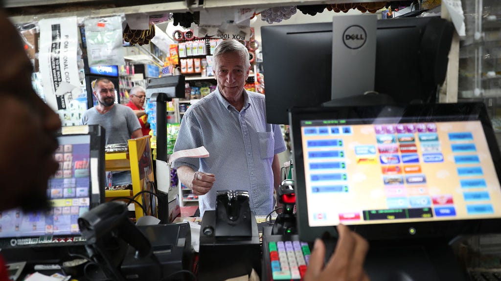 Powerball climbs to world record $1.6 billion