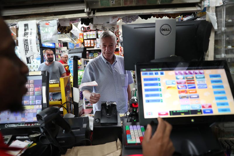 David Knight buys Powerball tickets at the Shell Gateway store