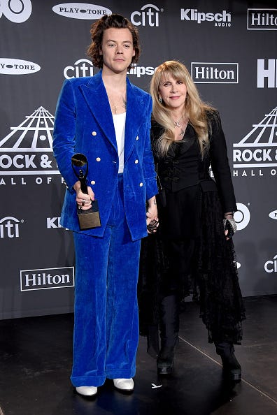 harry styles in blue at Stevie Nicks Rock and Roll Hall of Fame Induction Ceremony