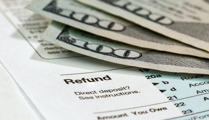Preparing income tax return - stock photo