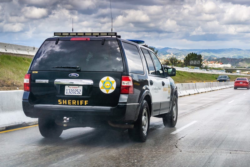 los angeles sheriff suv driving on highway