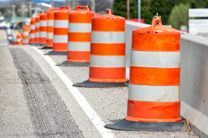 Stock image of orange construction barrels
