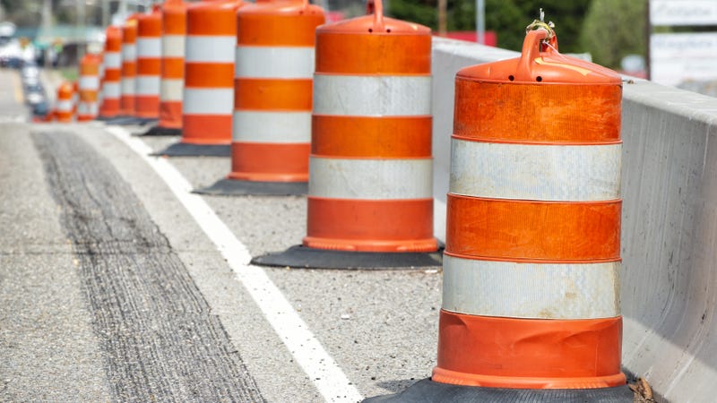Traffic barrels on road